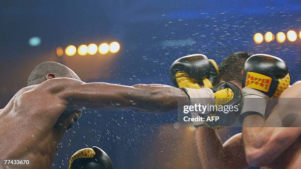 German boxer Felix Sturm and his challenger Randy Griffin of the US exchange punches during their WBA middleweight world champion fight 20 October...