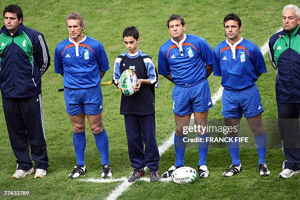 Irish referee Alain Rolland waits with touch judges Joel Jutge and Paul Honiss , 4th official Alan Lewis and 5th official Steve Walsh before the...