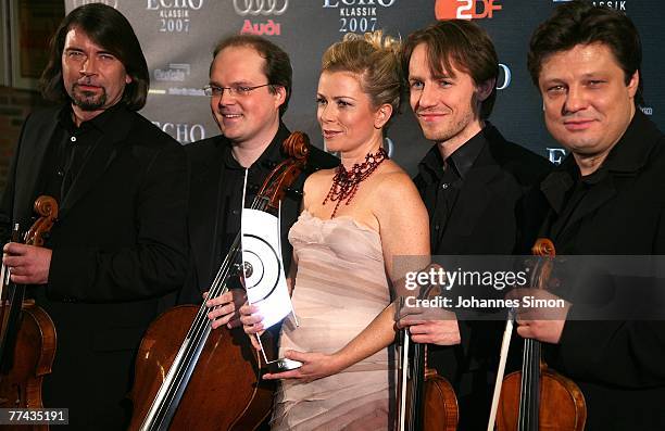 Singer Christine Schaefer poses with musicians during the Echo Klassik Award at Gasteig Kulturzentrum on October 21, 2007 in Munich, Germany.