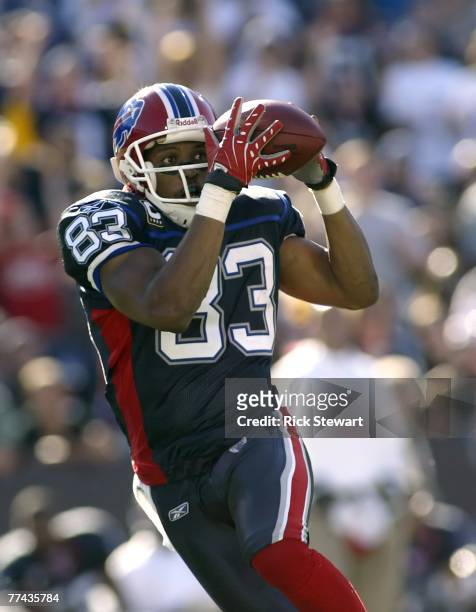 Lee Evans of the Buffalo Bills makes a 54 yard pass reception against the Baltimore Ravens on October 21, 2007 at Ralph Wilson Stadium in Orchard...
