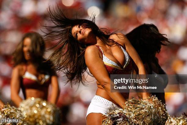 Washington Redskins cheerleaders perform during a timeout in a game against the Arizona Cardinals at FedEx Field October 21, 2007 in Landover,...