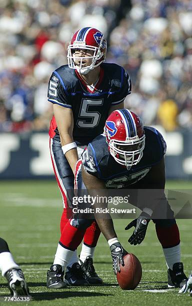 Trent Edwards of the Buffalo Bills readies to take a snap from Melvin Fowler against the Baltimore Ravens on October 21, 2007 at Ralph Wilson Stadium...