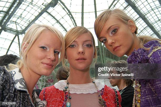 Caroline Winberg, Heather Marks and Caroline Trentini backstage at Chanel Spring/Summer 2006