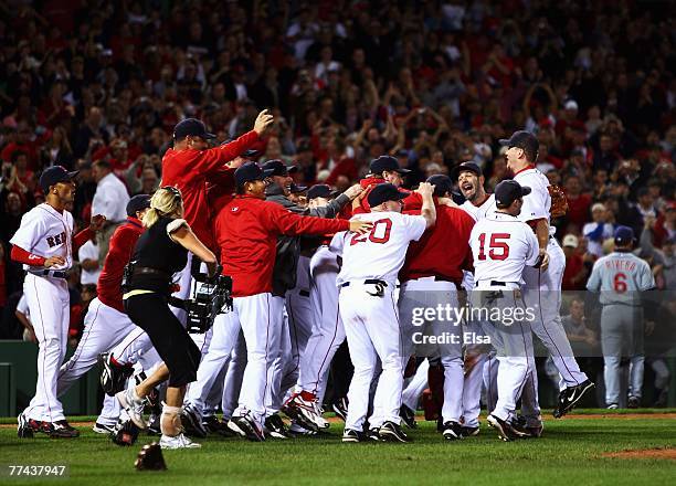 The Boston Red Sox celebrate after defeating the Cleveland Indians by the score of 11-2 to win the American League Championship Series in seven games...