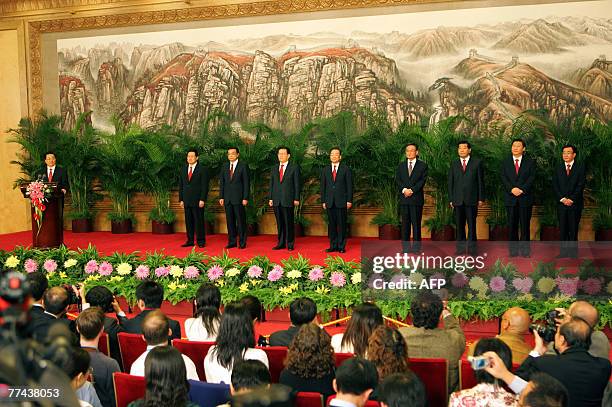 Chinese President Hu Jintao introduces the communist party's new leadership team, Zhou Yongkang, Li Keqing, Li Changchun, Wen Jiabao, Wu Bangguo, Jia...