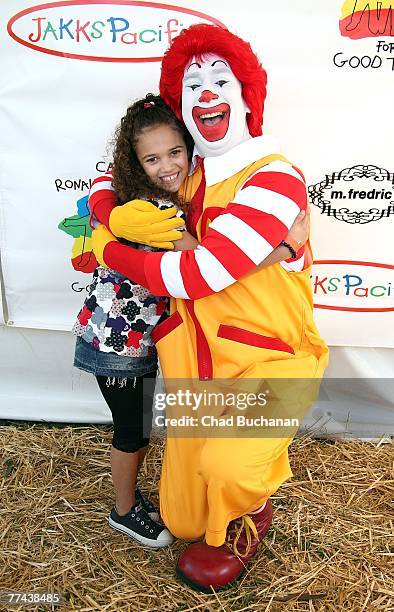 Actress Madison Pettis and the Ronald McDonald clown attend the Camp Ronald McDonald 15th Annual Family Halloween Carnival on October 21, 2007 in Los...