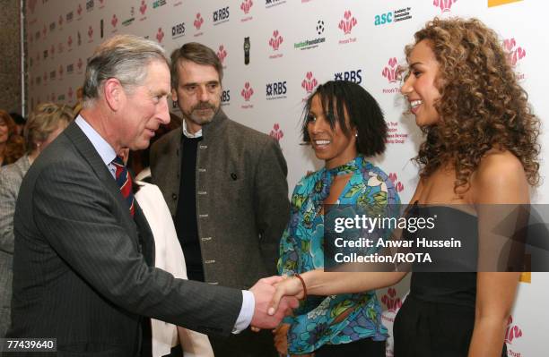 Prince Charles, Prince of Wales greets Television talent show 'X-Factor' winnner Leona Lewis as she stands with athlete Dame Kelly Holmes and actor...