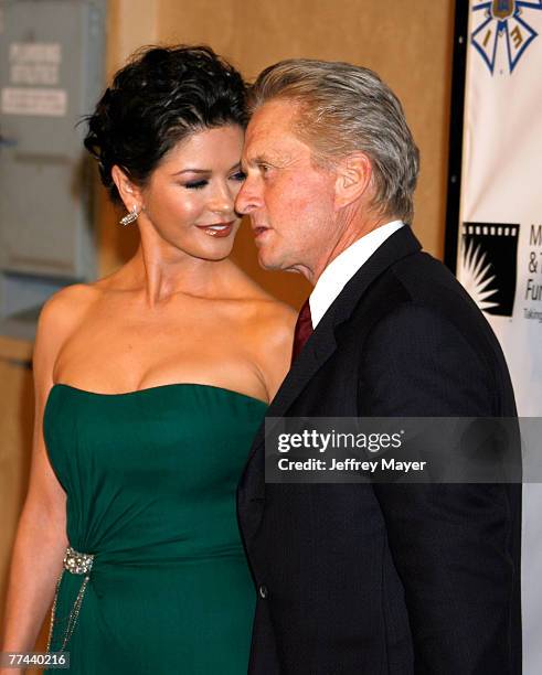 Actress Catherine Zeta-Jones and husband actor Michael Douglas arrive at "A Fine Romance" To Benefit The Motion Picture & Television Fund at Sony...