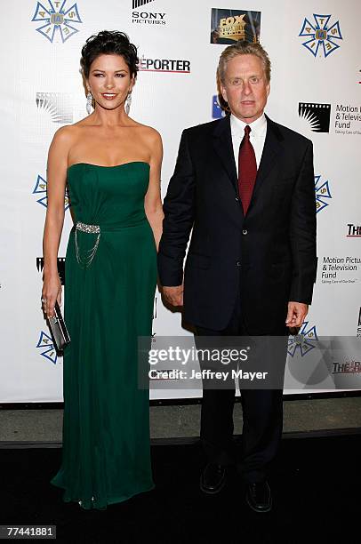 Actress Catherine Zeta-Jones and husband actor Michael Douglas arrive at "A Fine Romance" To Benefit The Motion Picture & Television Fund at Sony...