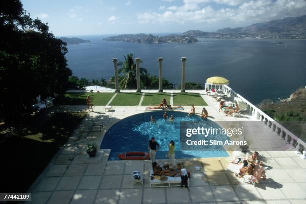 Guests at the Villa Nirvana, owned by Oscar Obregon, in Las Brisas, Acapulco, Mexico, February 1972.