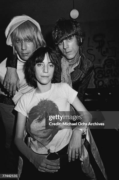 Patti Smith poses with Iggy Pop and James Williamson of The Stooges in November 1974 backstage at the Whisky a Go Go in Los Angeles California.
