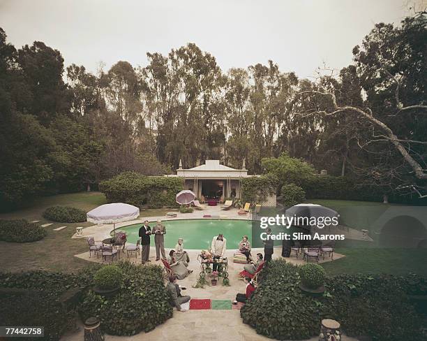 Premium Rates Apply. A party by James Pendleton's pool in Beverly Hills, California, 1952. Pendleton's house was later bought by Hollywood director...