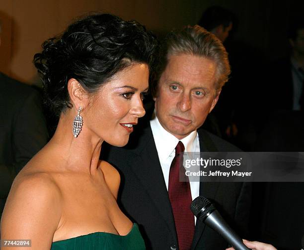 Actress Catherine Zeta-Jones and husband actor Michael Douglas arrive at "A Fine Romance" To Benefit The Motion Picture & Television Fund at Sony...