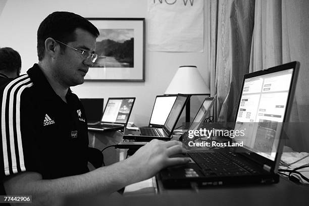 Team video analyst Andrew Sullivan prepares stats in the team room following the 2007 Tri Nations match between the New Zealand All Blacks and the...