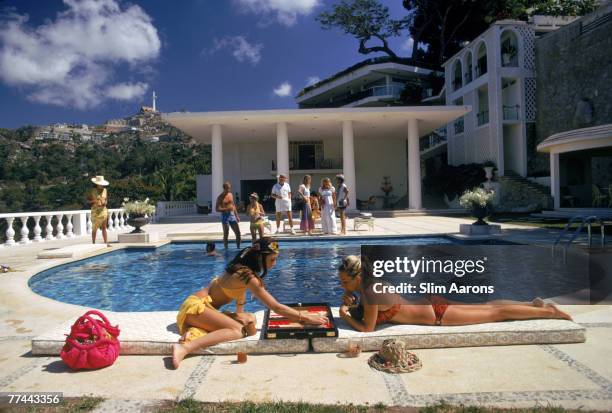 Guests at the Villa Nirvana, owned by Oscar Obregon, in Las Brisas, Acapulco, Mexico, 1972.