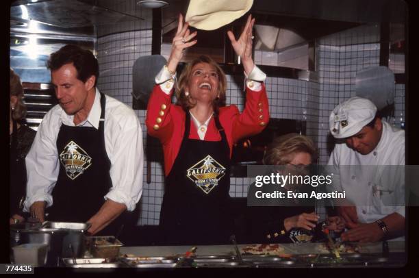 New York Lieutenant Governor Betsy McCaughey and Dr. Ruth Westheimer stand in the kitchen at the grand opening of California Pizza Kitchen near...