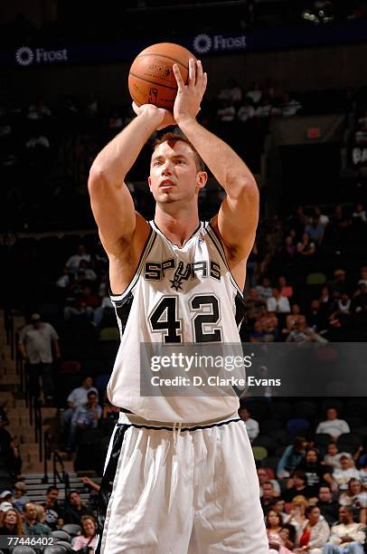 Kris Lang of the San Antonio Spurs shoots a free throw during the game against Panathinaikos at the AT&T Center on October 13, 2007 in San Antonio,...