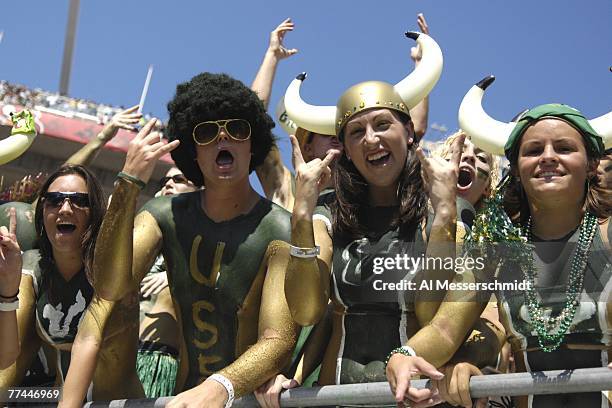 Fans of the University of South Florida Bulls celebrates during play against the University of Central Florida Knights at Raymond James Stadium on...