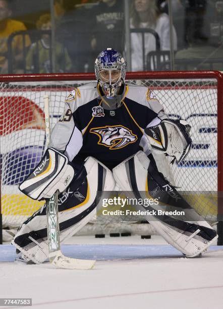 Goaltender Dan Ellis of the Nashville Predators warms up prior to a game against the Dallas Stars at the Sommet Center on October 6, 2007 in...