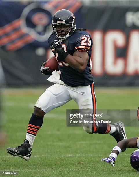 Adrian Peterson of the Chicago Bears runs against the Minnesota Vikings on October 14, 2007 at Soldier Field in Chicago, Illinois. The Vikings...