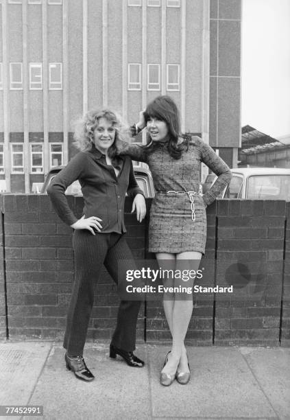 British actresses Polly James and Nerys Hughes, the stars of British sitcom 'The Liver Birds', pose outside the BBC Television Rehearsal Rooms on...