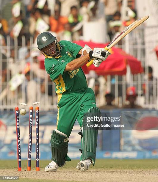 Charl Langeveldt of South Africa is bowled by Rao Iftikhar during the third One Day International match between Pakistan and South Africa held at...