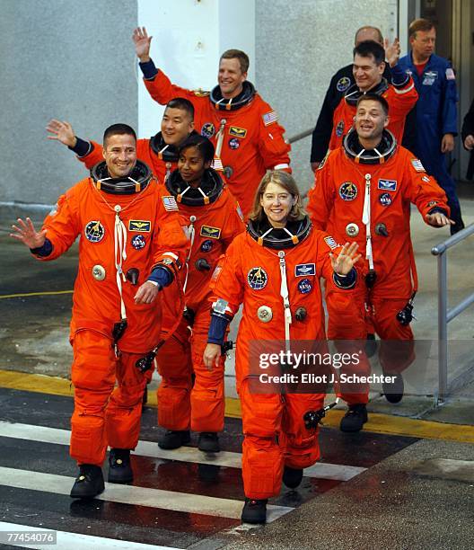 Space Shuttle Discovery astronauts, Pamela A. Melroy, STS-120 commander; George D. Zamka, STS-120 pilot; mission specialists Stephanie D. Wilson,...