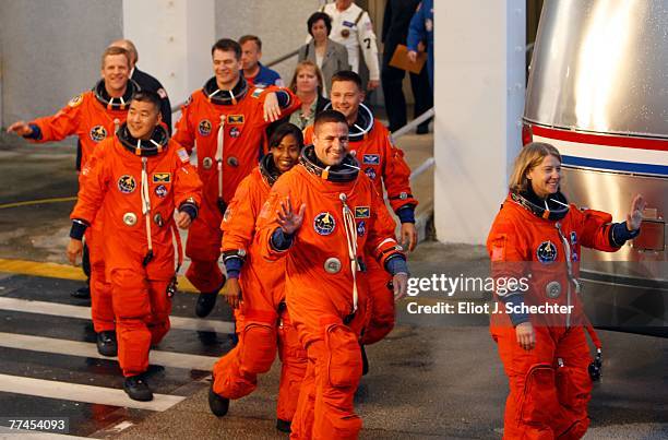 Space Shuttle Discovery astronauts, Pamela A. Melroy, STS-120 commander; George D. Zamka, STS-120 pilot; mission specialists Stephanie D. Wilson,...