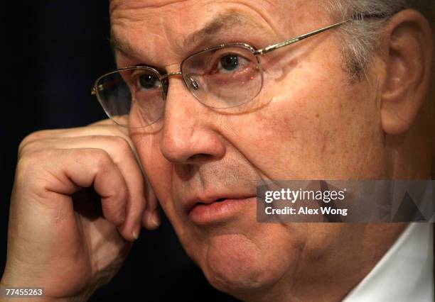 Sen. Larry Craig listens during a hearing on the impacts of global warming on public health before the Senate Committee on Environment and Public...