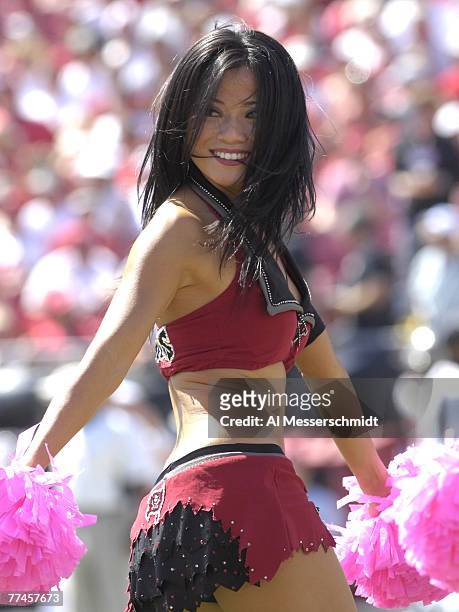 Cheerleader of the Tampa Bay Buccaneers entertains during play against the Tennessee Titans at Raymond James Stadium on October 14, 2007 in Tampa,...
