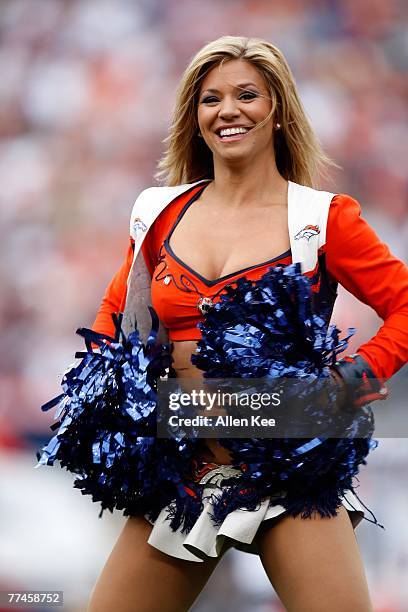 Denver Broncos cheerleader dances during the game against the Jacksonville Jaguars at Invesco Field at Mile High on September 23, 2007 in Denver,...