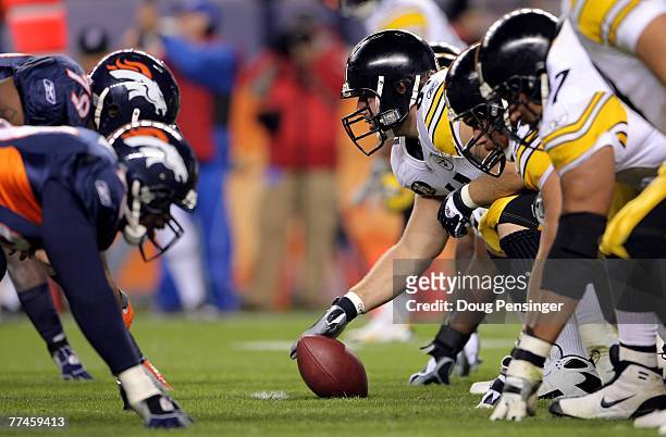 The Pittsburgh Steelers face off at the line of scrimmage against the Denver Broncos at Invesco Field at Mile High on October 21, 2007 in Denver,...