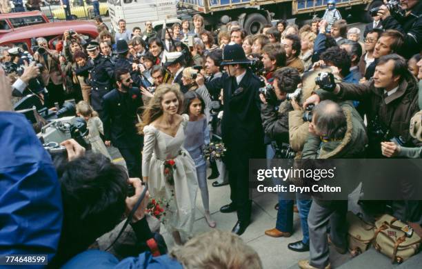 Former Beatle Ringo Starr and American actress Barbara Bach arriving at Marylebone Register Office for their wedding, London, April 27, 1981. Their...