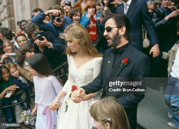 Former Beatle Ringo Starr and American actress Barbara Bach leaving Marylebone Register Office after their wedding, London, April 27, 1981. Their...