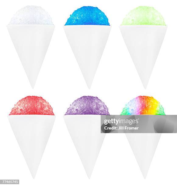 six snow cones in various flavors. - slush stock pictures, royalty-free photos & images