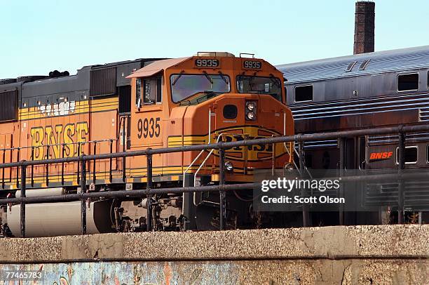 Burlington Northern Santa Fe engine pulls a train loaded with coal October 23, 2007 in Chicago, Illinois. BNSF today reported record quarterly...
