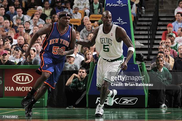 Kevin Garnett of the Boston Celtics guards Zach Randolph of the New York Knicks during the game at the TD Banknorth Garden on October 17, 2007 in...