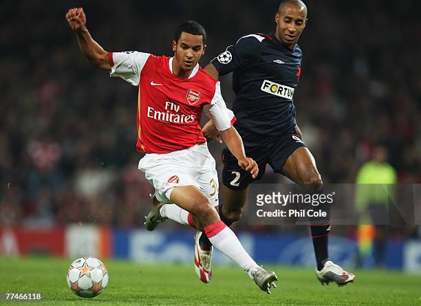 Theo Walcott of Arsenal goes past Mickael Tavares of Slavia Prague during the UEFA Champions League Group H match between Arsenal and Slavia Prague...