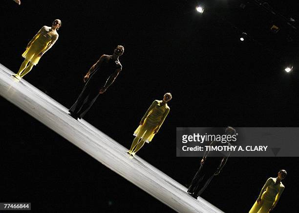 Dancers with the Ballet Du Grand Theatre De Geneve perform "Para-Dice" during a dress rehearsal before opening night 23 October 2007 at the Joyce...