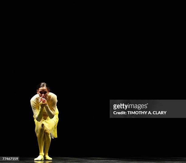 Dancer Helene Bourbeillon with the Ballet Du Grand Theatre De Geneve performs "Para-Dice" during a dress rehearsal before opening night 23 October...