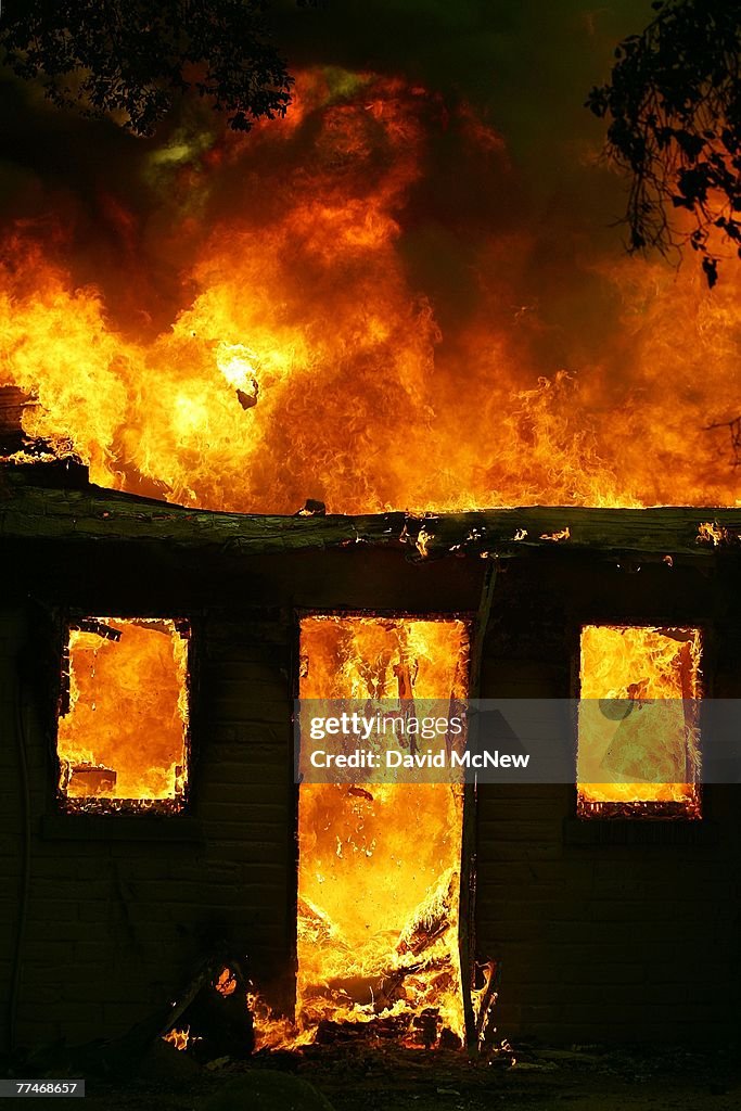 Santa Ana Winds Stoke Wildfires In Southern California