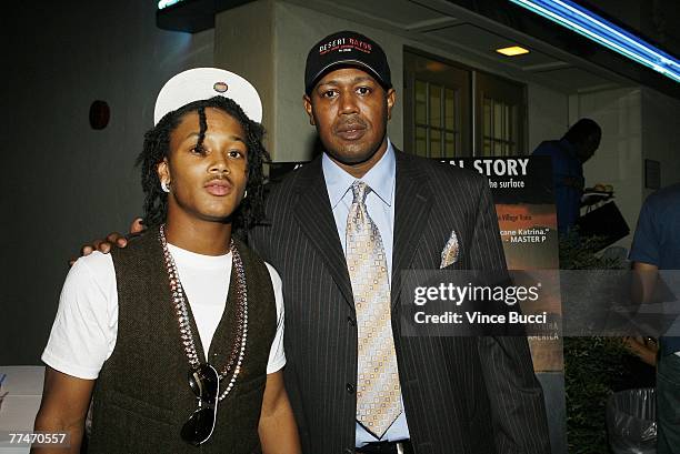 Actor/rapper Lil' Romeo and his father, musician/producer Percy "Master P" Miller attends the Los Angeles premiere of the Cinema Libre Studio film...