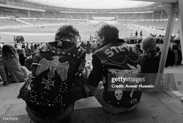 Two rockers attend the London Rock 'n' Roll Revival at Wembley Stadium, 5th August 1972.