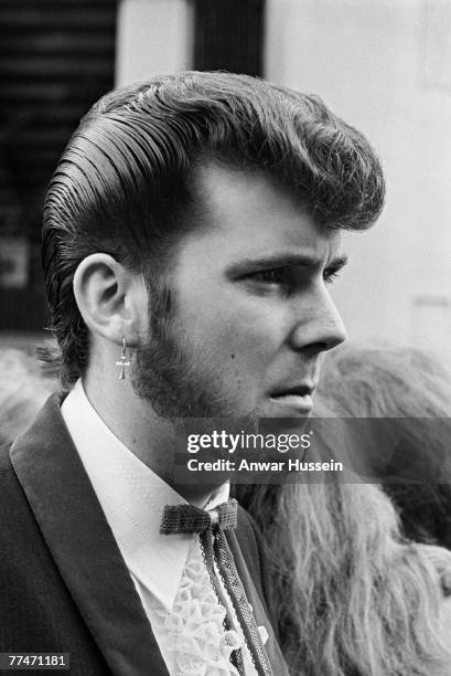 Teddy boy sports an immaculate quiff and 'Slim Jim' tie during the London Rock 'n' Roll Revival at Wembley Stadium, 5th August 1972.