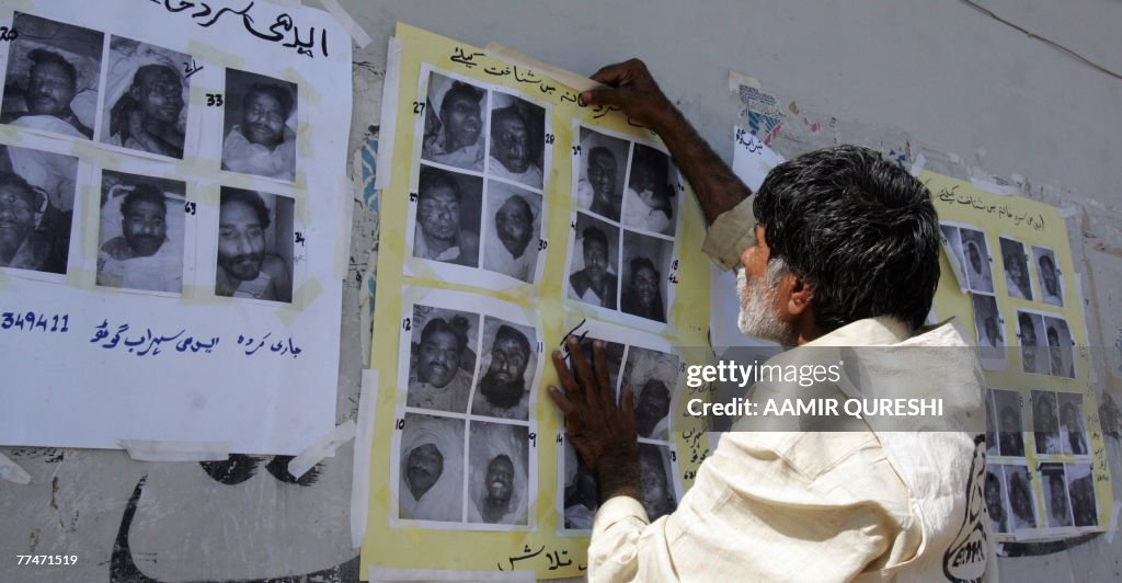 A Pakistnai worker of a morgue, run by a