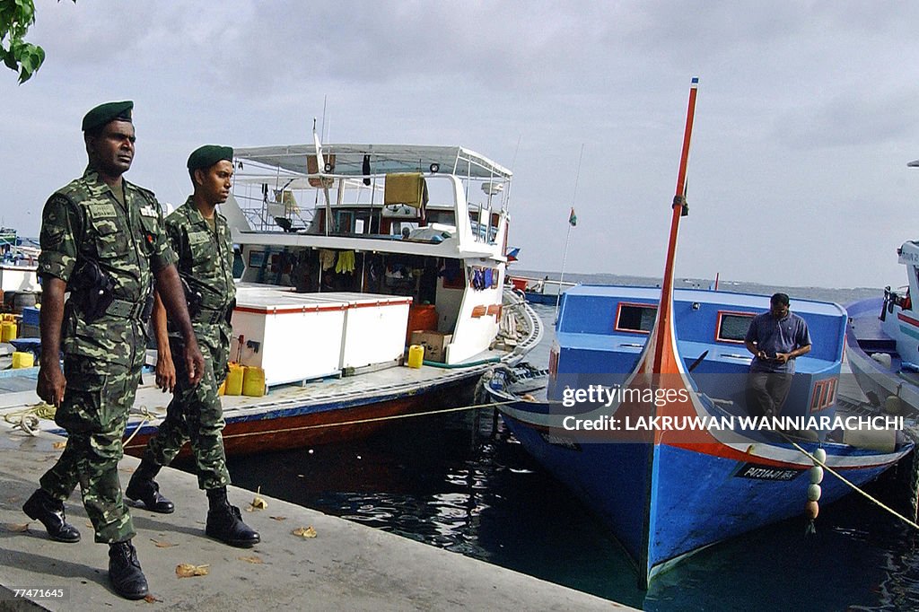Maldivian security forces patrol at the