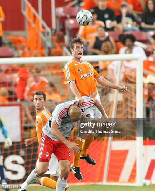 Houston Dynamo Eddie Robinson climbs Toronto FC defender Maurice Edu on July 15, 2007 at Robertson Stadium in Houston, Texas. The Dynamo tied Toronto...