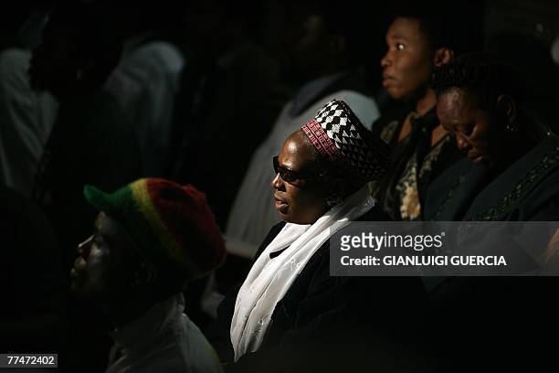 Friend and relatives of South African reggae musician Lucky Dube attend, 24 October 2007, his memorial service at the Bassline music club in downtown...