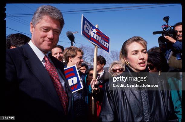 Hillary and Bill Clinton speak to reporters February 16, 1992 in New Hampshire. Mrs. Clinton is campaigning for her husband to be the Democratic...