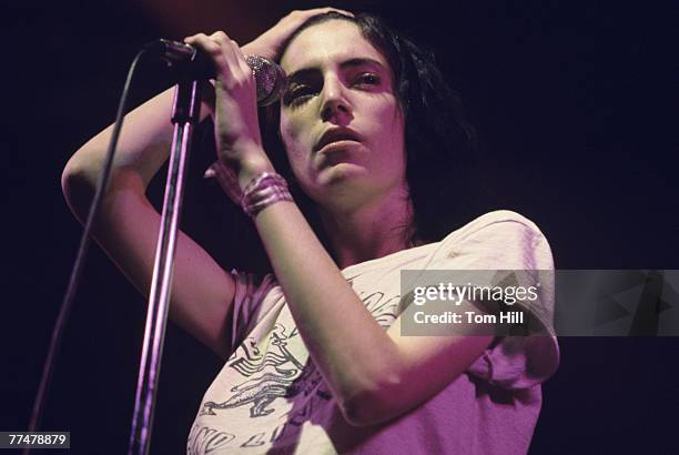 Singer-songwriter-poet Patti Smith performs at Alex Cooley's Electric Ballroom on January 23, 1976 in Atlanta, Georgia.